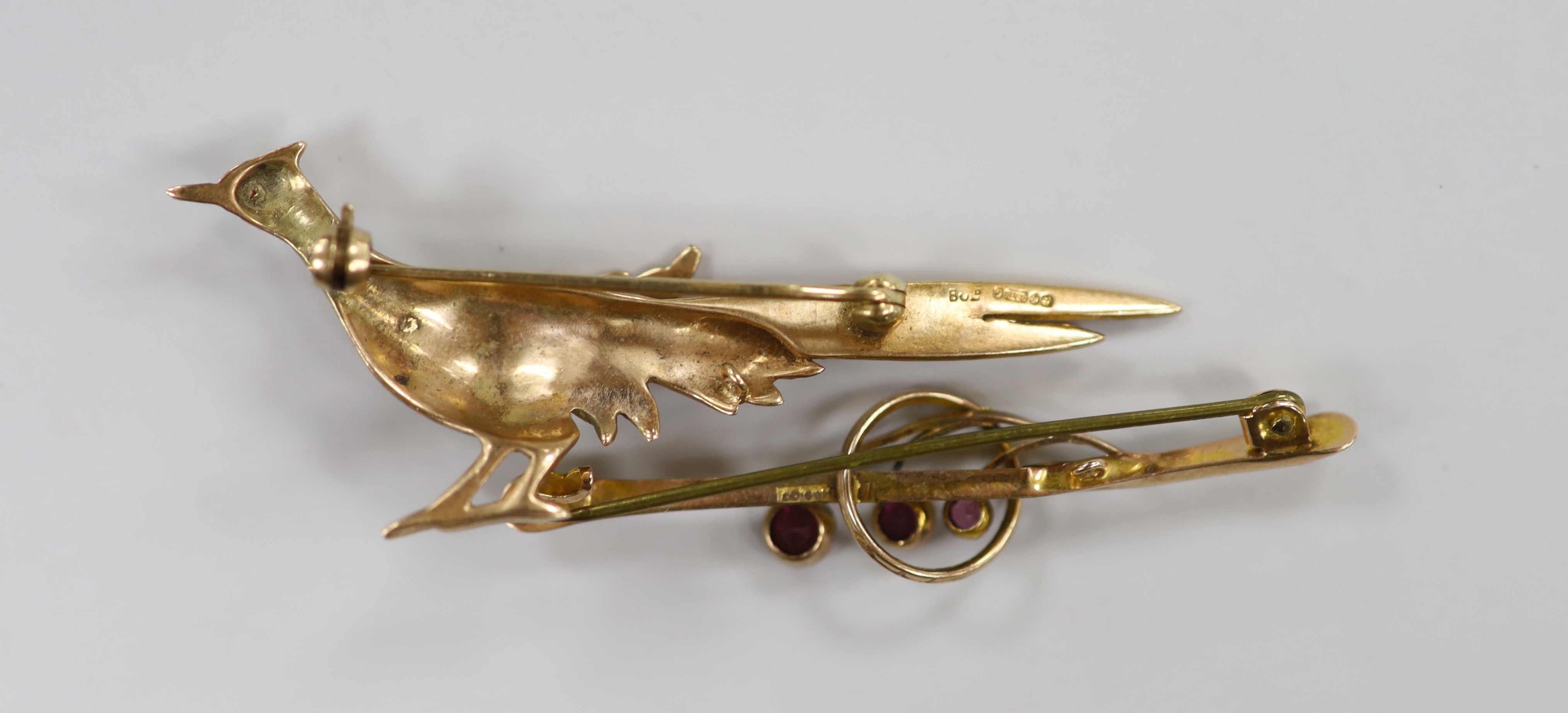 A 1960's 9ct gold pheasant brooch, 60mm and an earlier 9ct and gem set bar brooch, gross weight 7.3 grams.